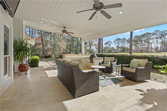 view of patio with an outdoor hangout area, outdoor dry bar, and a ceiling fan