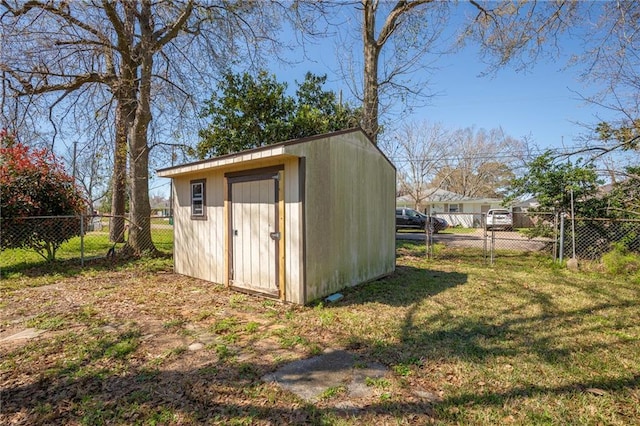 view of shed featuring a fenced backyard