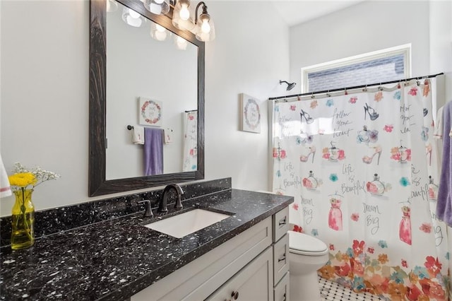 bathroom featuring a shower with curtain, toilet, and vanity