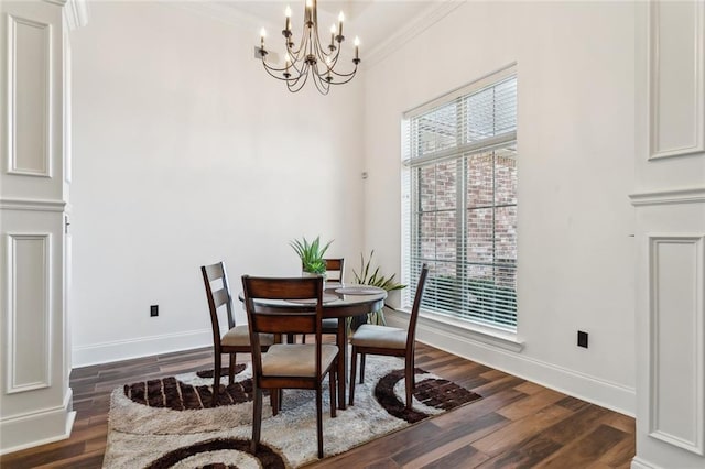 dining space featuring baseboards, plenty of natural light, and ornamental molding