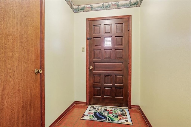 doorway with baseboards