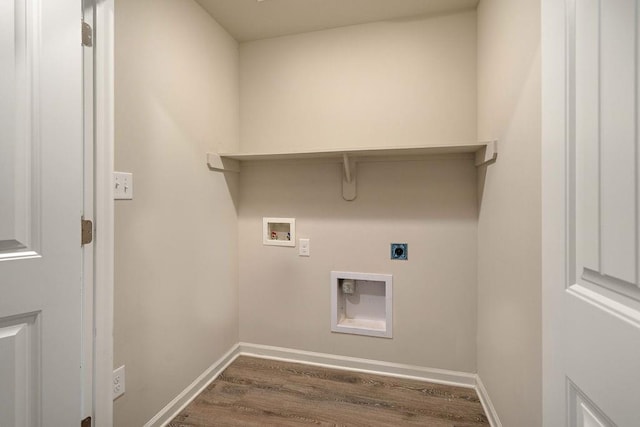 laundry room featuring baseboards, dark wood finished floors, washer hookup, laundry area, and hookup for an electric dryer