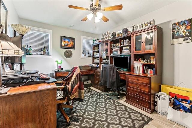 office area with ceiling fan