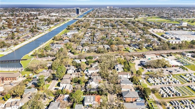 aerial view featuring a water view and a residential view