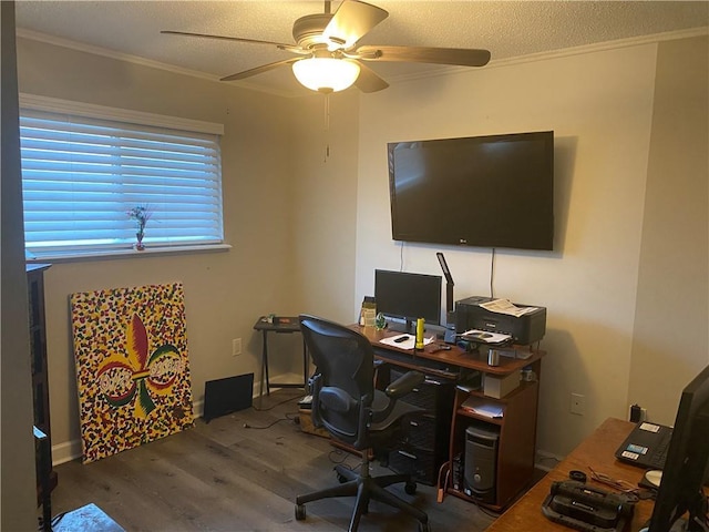 office featuring ceiling fan, a textured ceiling, wood finished floors, and crown molding