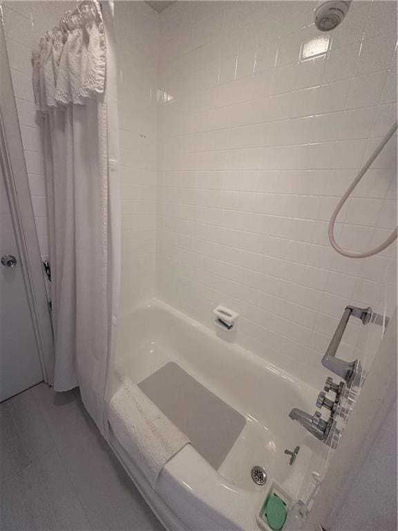 full bathroom with shower / bathtub combination with curtain