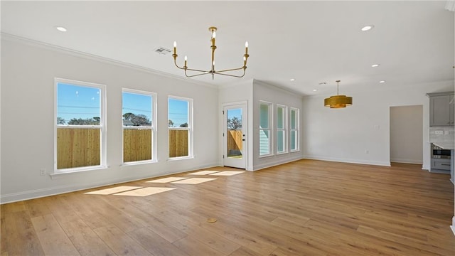 interior space featuring recessed lighting, visible vents, light wood-style floors, and crown molding