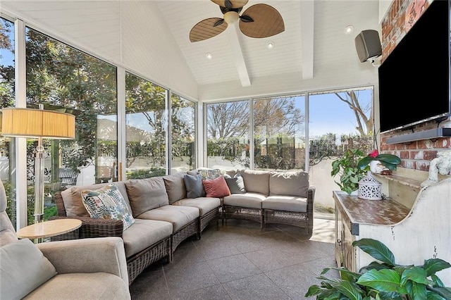 sunroom with lofted ceiling and ceiling fan