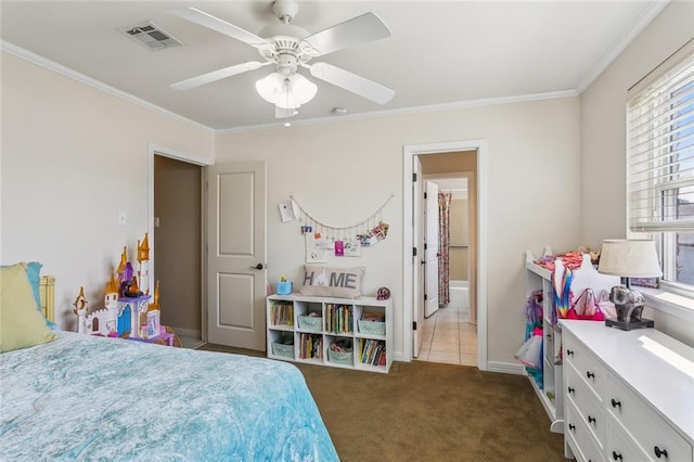 carpeted bedroom with visible vents, baseboards, ceiling fan, and crown molding