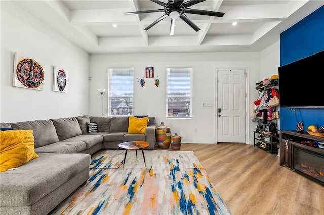 living room with wood finished floors, coffered ceiling, recessed lighting, ceiling fan, and beamed ceiling