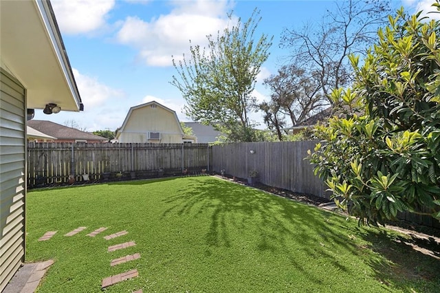 view of yard with a fenced backyard