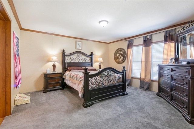 carpeted bedroom featuring crown molding