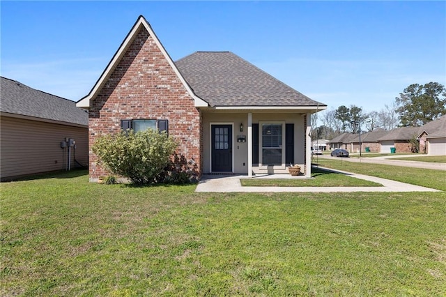 bungalow-style home with brick siding, roof with shingles, and a front yard