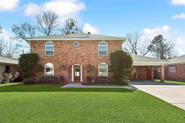 view of front of house featuring concrete driveway, brick siding, and a front lawn