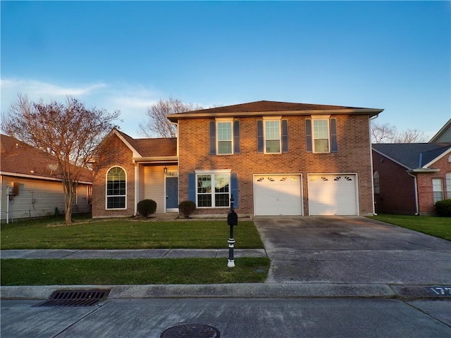 view of front of home featuring brick siding, driveway, an attached garage, and a front yard