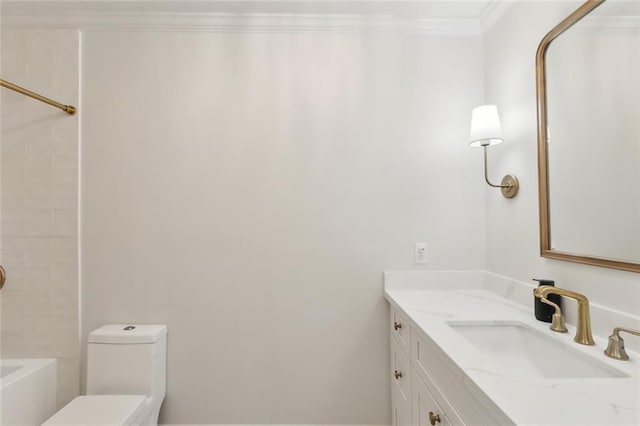 bathroom featuring toilet,  shower combination, ornamental molding, and vanity