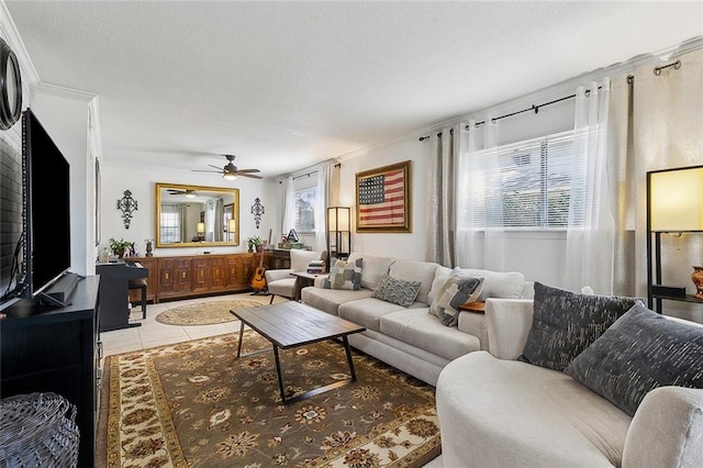 living room with light tile patterned floors, a textured ceiling, and ceiling fan