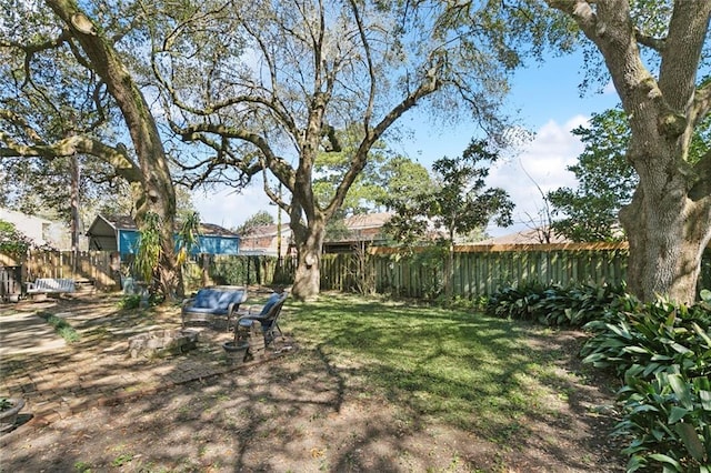 view of yard featuring a fenced backyard