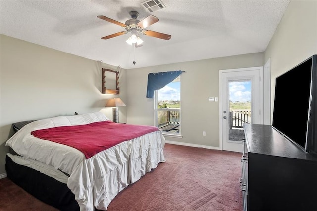 bedroom with visible vents, multiple windows, carpet flooring, and access to outside