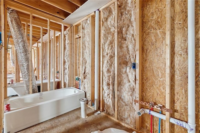 bathroom featuring a freestanding bath