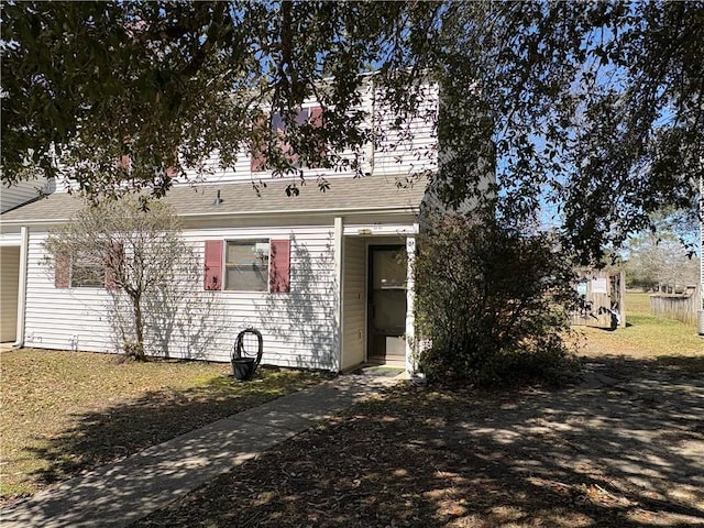 view of front of home featuring a shingled roof