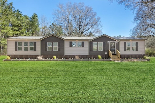 20228 Stafford Rd, Kentwood, LA 70444 - view of front facade with a front yard