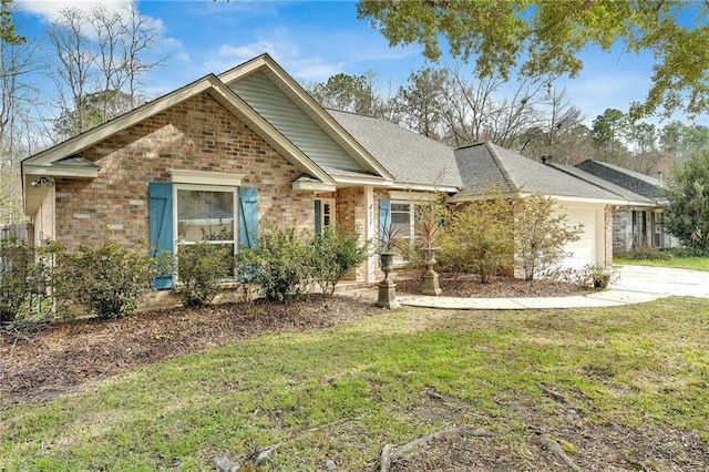 view of front of property featuring brick siding, a front lawn, concrete driveway, roof with shingles, and a garage