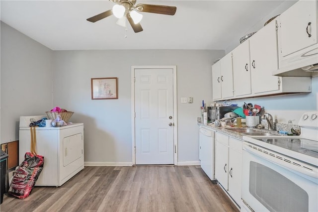 kitchen with light countertops, washer / dryer, light wood-style flooring, white cabinets, and white appliances