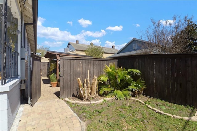 view of yard featuring a fenced backyard and a patio area