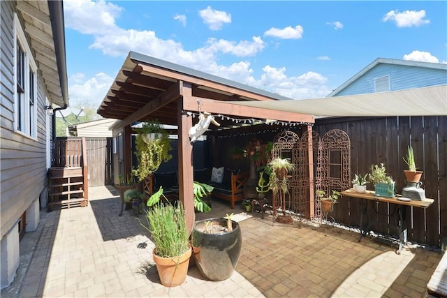 view of patio / terrace with a fire pit