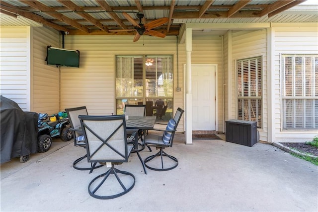 view of patio / terrace with outdoor dining area and a ceiling fan