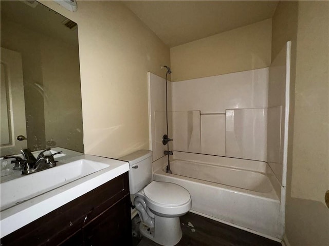 full bathroom with shower / bath combination, toilet, and vanity