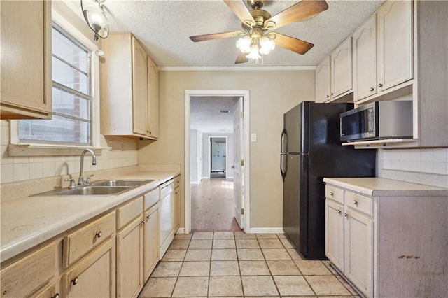 kitchen with white dishwasher, light countertops, a textured ceiling, stainless steel microwave, and tasteful backsplash