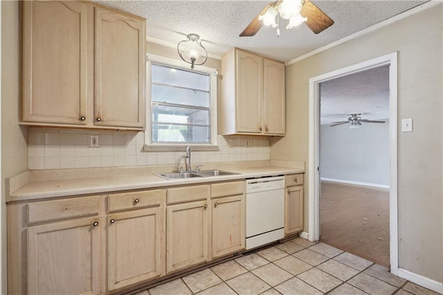 kitchen with a ceiling fan, white dishwasher, light brown cabinetry, a sink, and backsplash