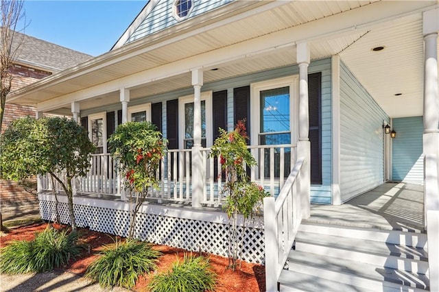 entrance to property with covered porch