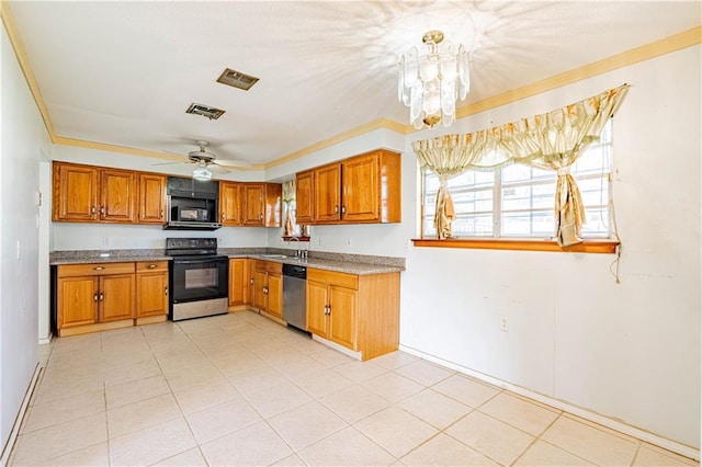 kitchen featuring a sink, brown cabinets, black appliances, and ornamental molding