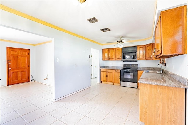 kitchen with visible vents, ceiling fan, ornamental molding, black appliances, and a sink