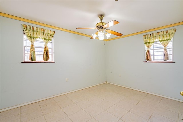 empty room with crown molding and ceiling fan