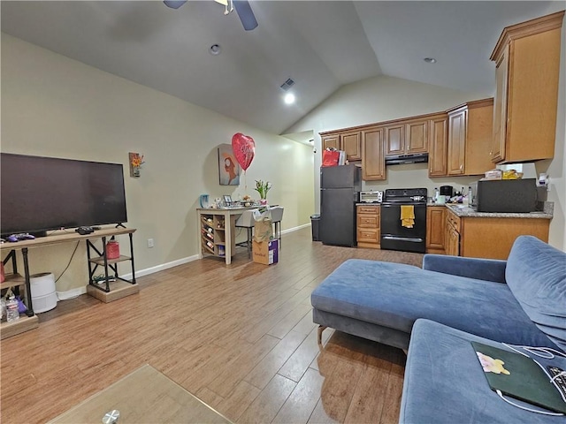 living area with visible vents, high vaulted ceiling, light wood-style flooring, baseboards, and ceiling fan