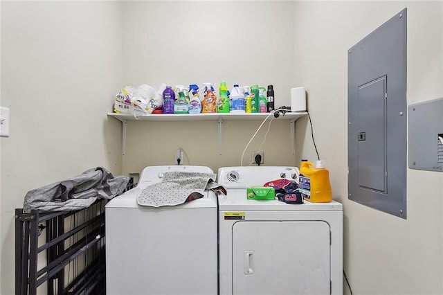 laundry room with electric panel, laundry area, and independent washer and dryer