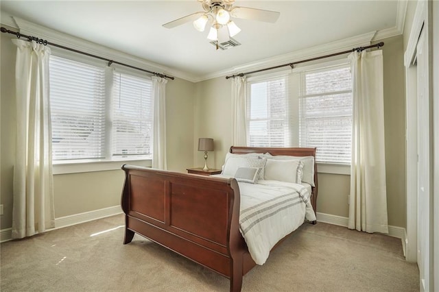 bedroom featuring light carpet, multiple windows, and ornamental molding