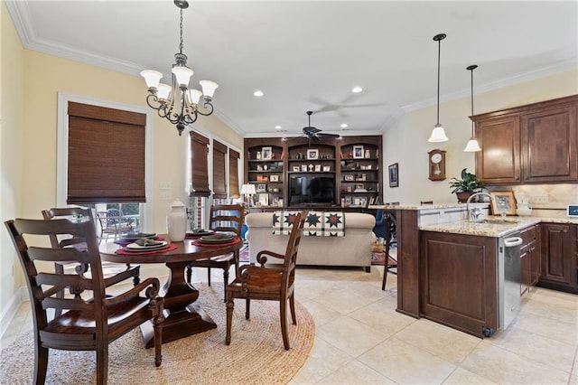 dining room with light tile patterned floors, built in features, and crown molding