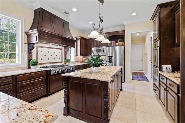 kitchen featuring dark brown cabinets, premium range hood, ornamental molding, appliances with stainless steel finishes, and open shelves