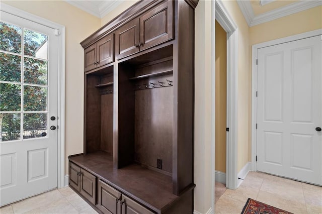 mudroom featuring light tile patterned floors, baseboards, and crown molding