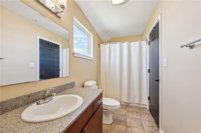 bathroom with a shower with curtain, toilet, and vanity