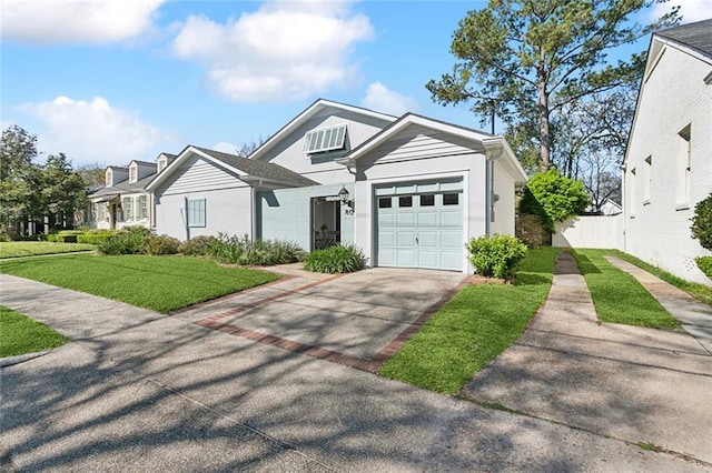 view of front facade with a garage, driveway, a front yard, and fence