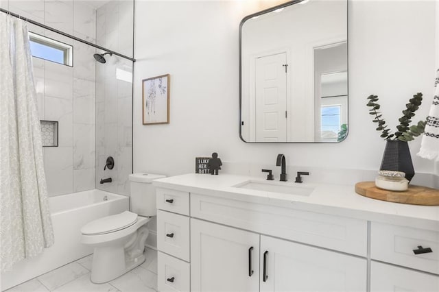 full bathroom with toilet, marble finish floor, shower / bath combo, and vanity