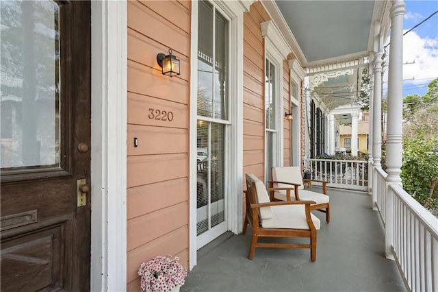 balcony featuring covered porch