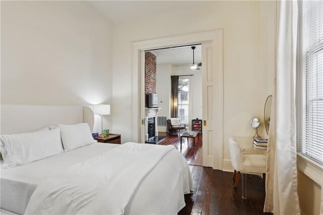 bedroom with hardwood / wood-style flooring