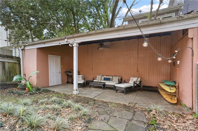 view of patio / terrace featuring outdoor lounge area, ceiling fan, and fence